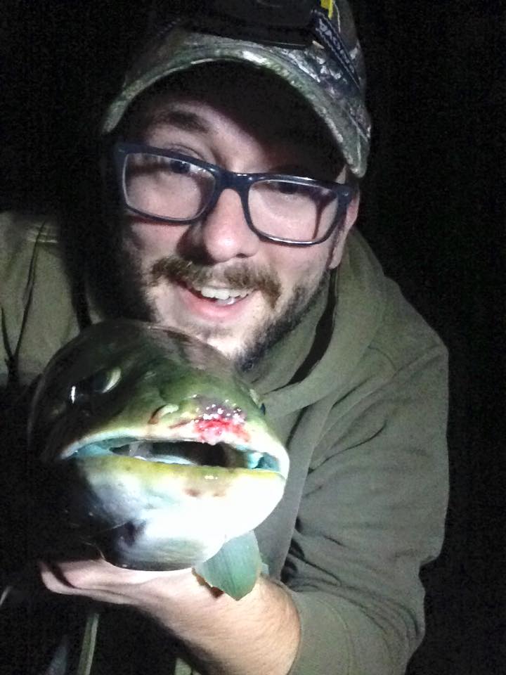 me holding a bowfin