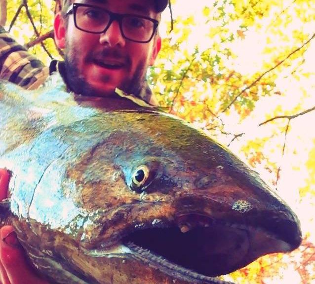 me holding a salmon